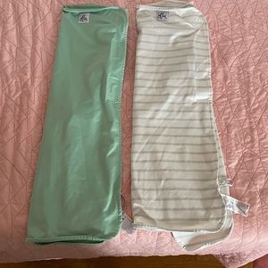 Two Ollie baby swaddles
